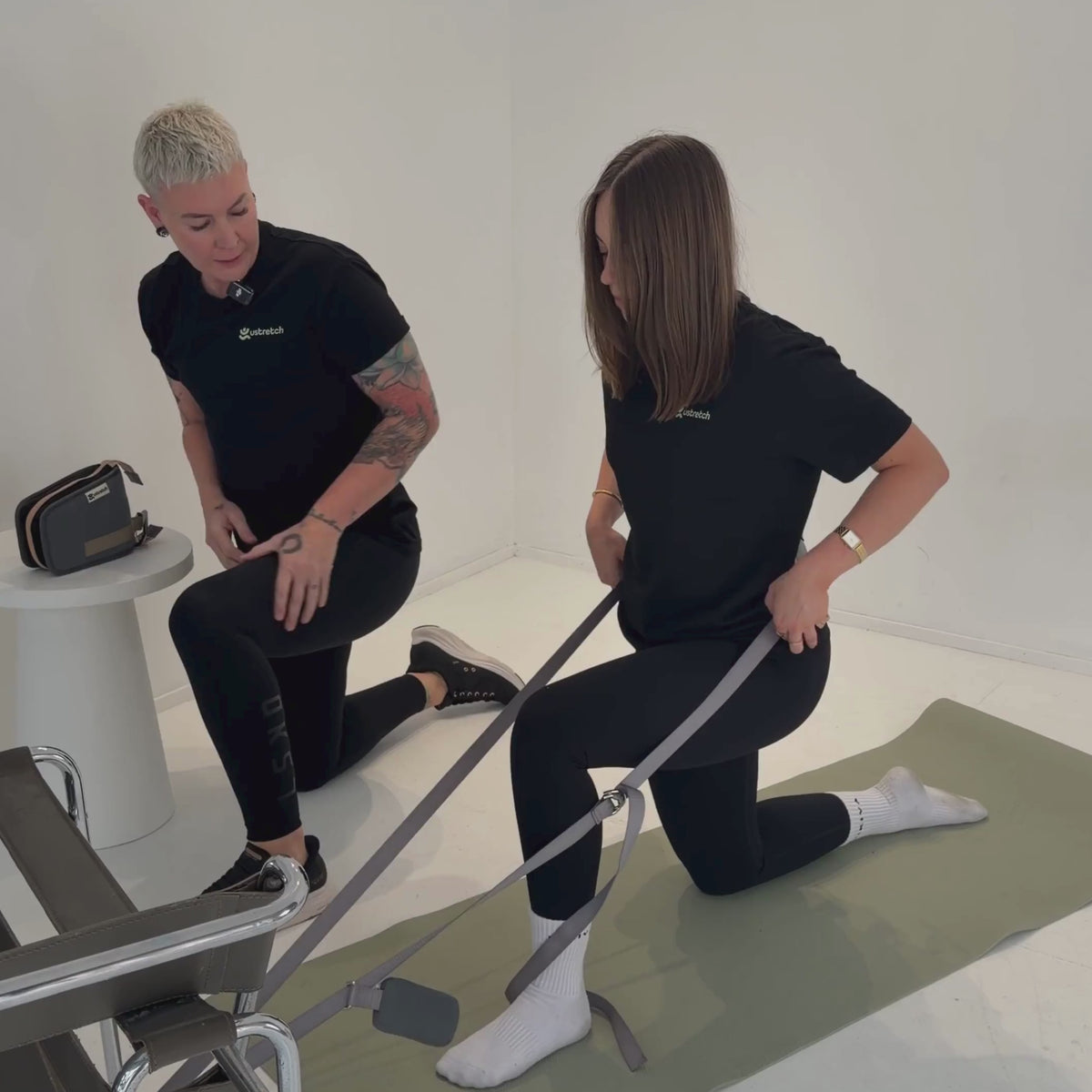 Ustretch adjustable stretching and mobility device used for hip flexor kneeling stretches. 